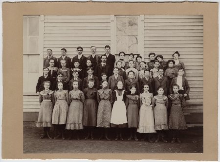 School picture of forty students and one teacher