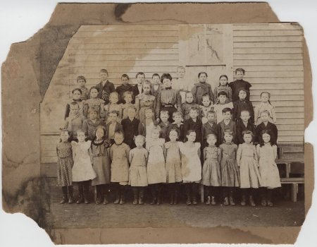 School picture of forty-three students and one teacher