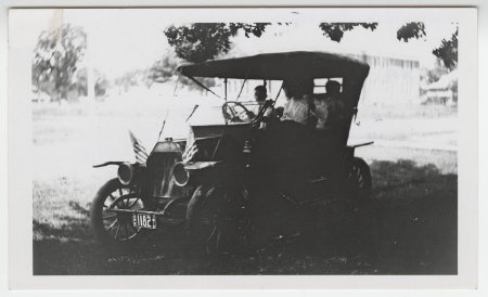 Joe Faulkner driving Overland Automobile, Russellville, Ark.