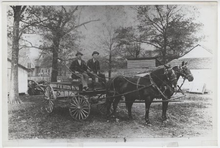 Men on Arkansas Steam Bottling Works Cart